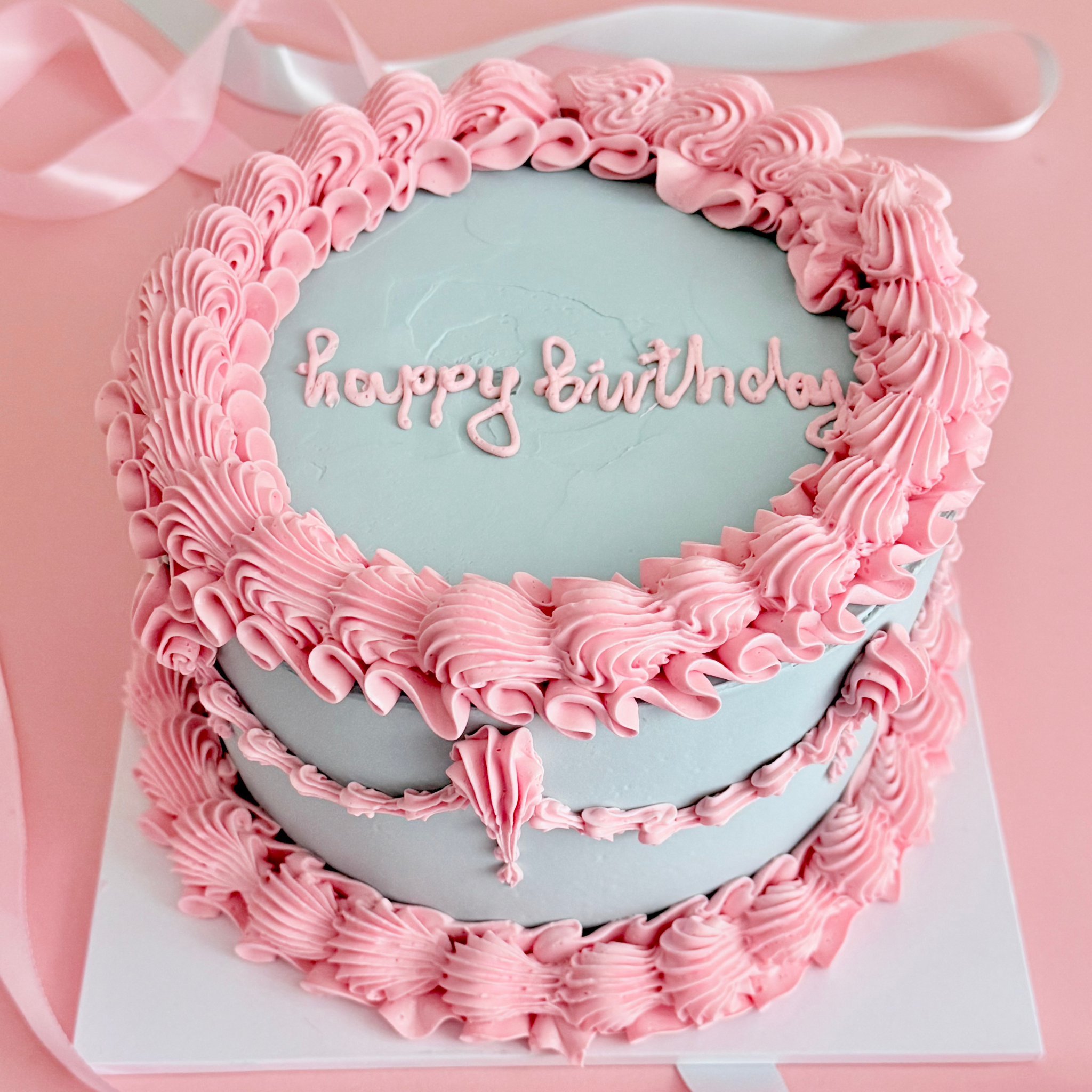 Blue & Pink Lambeth Cake - Cake Choice