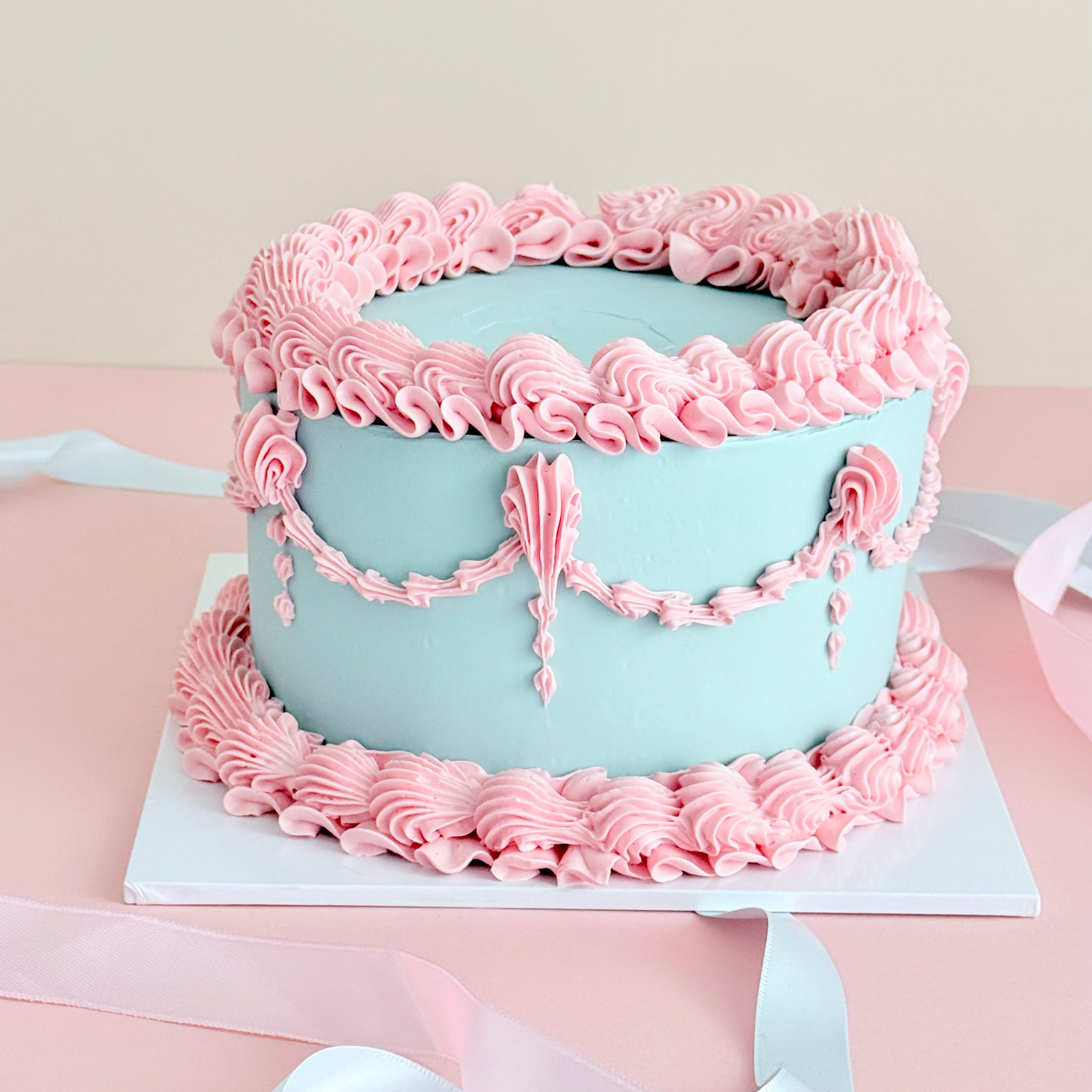 Blue & Pink Lambeth Cake - Cake Choice