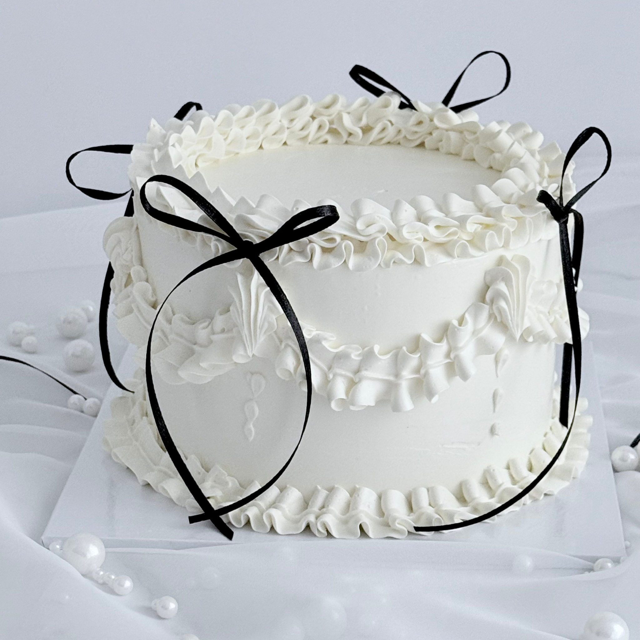 White Vintage Bow Cake - Cake Choice
